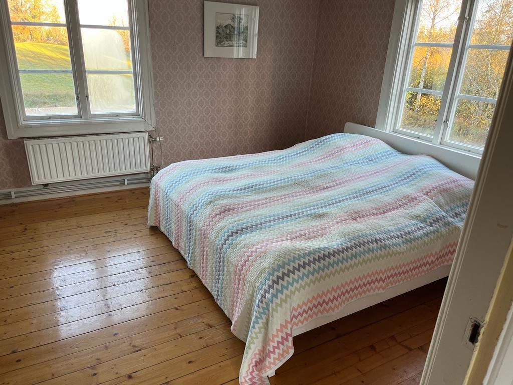 Bedroom with spacious bed and en-suite bathroom