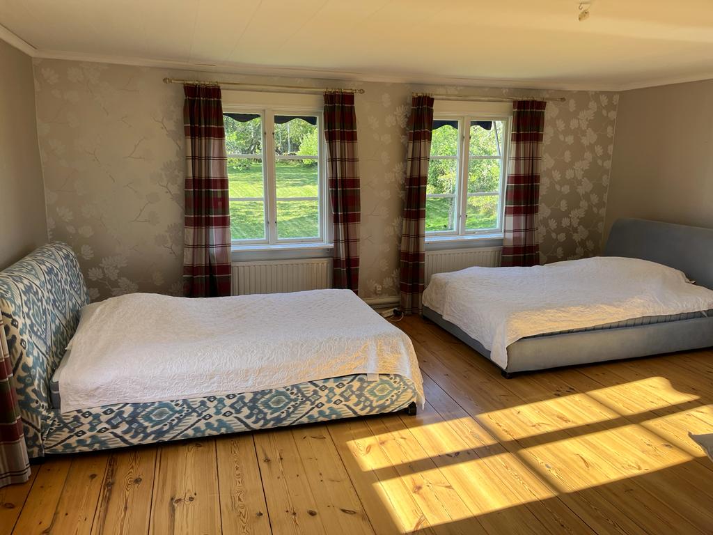 Master bedroom with spacious bed and en-suite bathroom